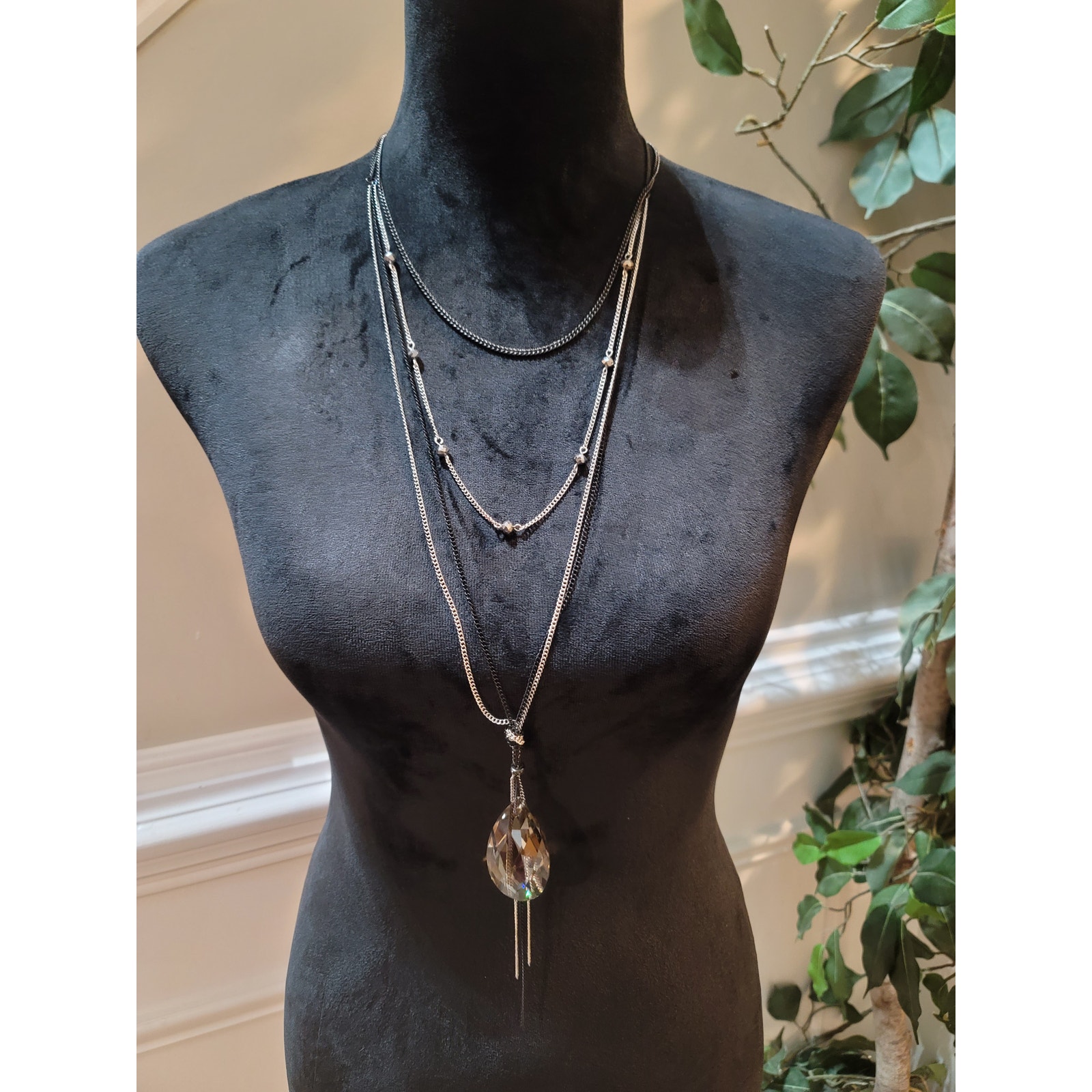 Elegant Three Layered Crystal Necklace With Teardrop Pendant And Silver Chain